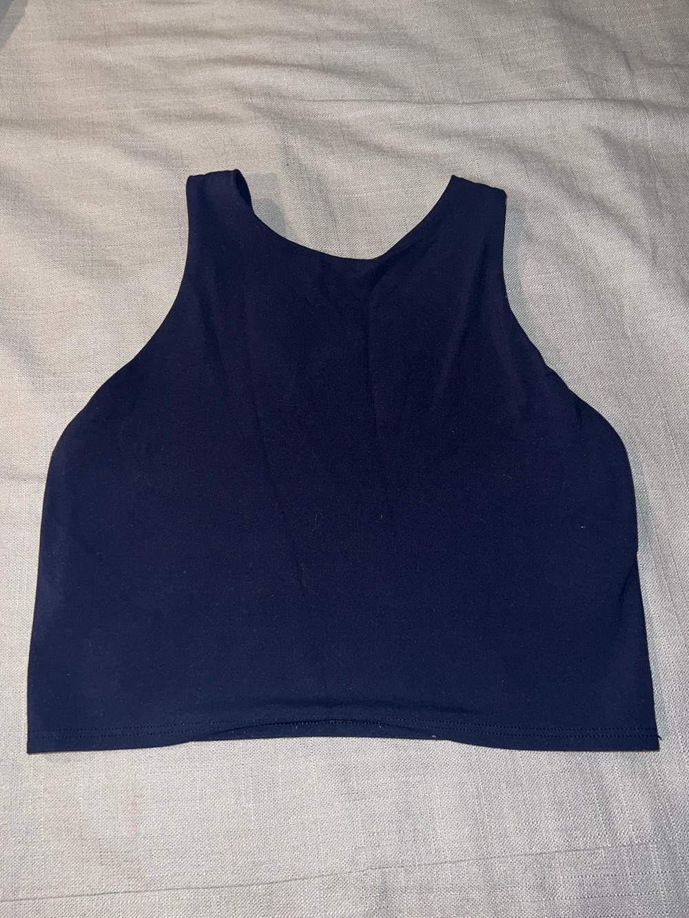Athleta longline sports bra in navy blue, size XS.